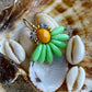 Mini blomsterørering med lysegrønne dråbe glasperler og flot mangofarvet glasperle