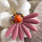 Stor blomster ørering af sjældne rosa glasperler.