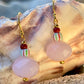 Ørering med rosa glas perle