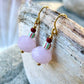 Ørering med rosa glas perle