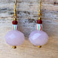 Ørering med rosa glas perle