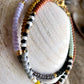 Armbånd med brun, grøn og lilla seed beads